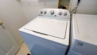 Whirlpool WTW4957PW 3.8 Cu. Ft. High Efficiency Top Load Washer being tested in writer's home