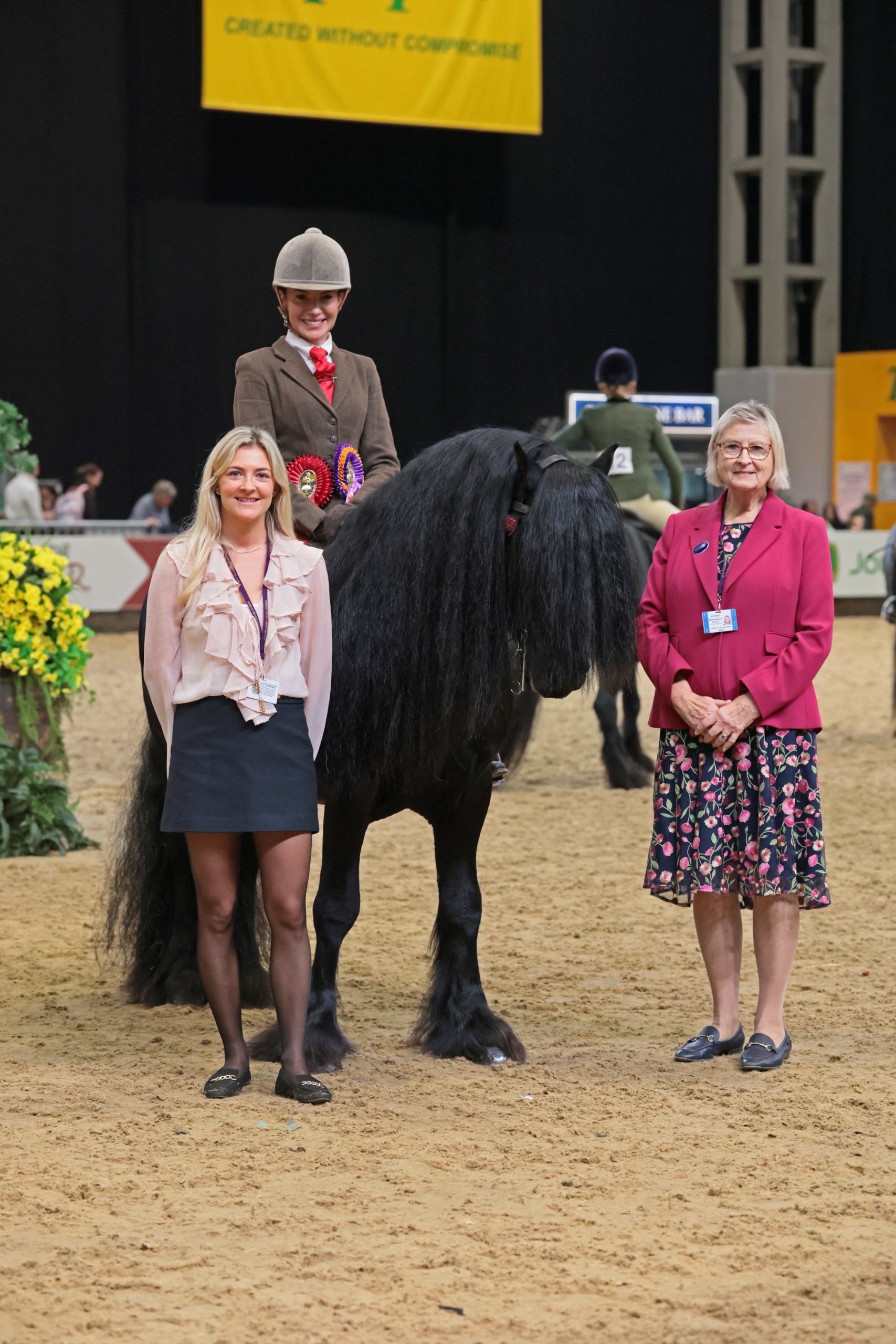 Greenrivers Luke and April Gilmartin stand for a photos with sponsors at HOYS