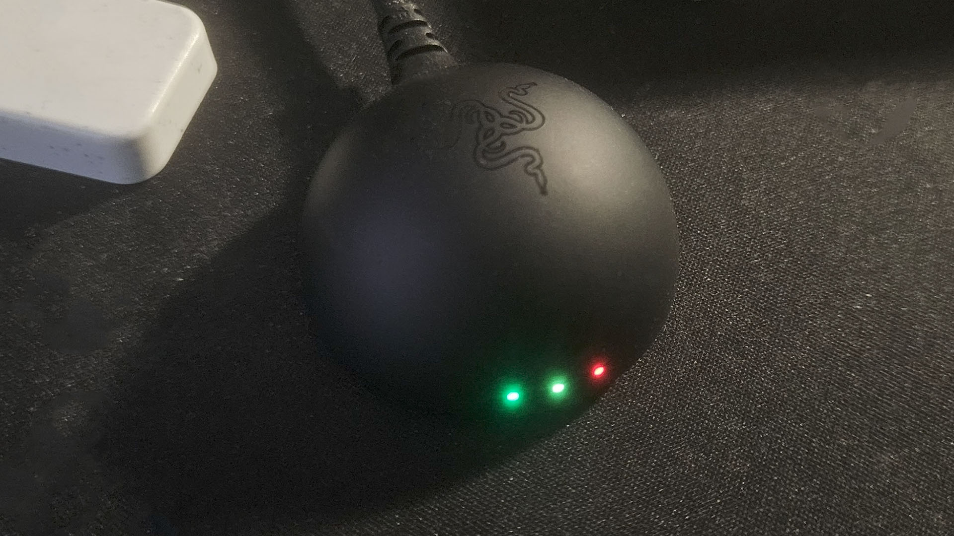 The Razer DeathAdder V4 Pro sensor on a desk