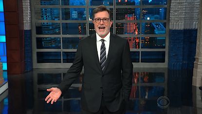 Stephen Colbert toasts plaid shirt guy