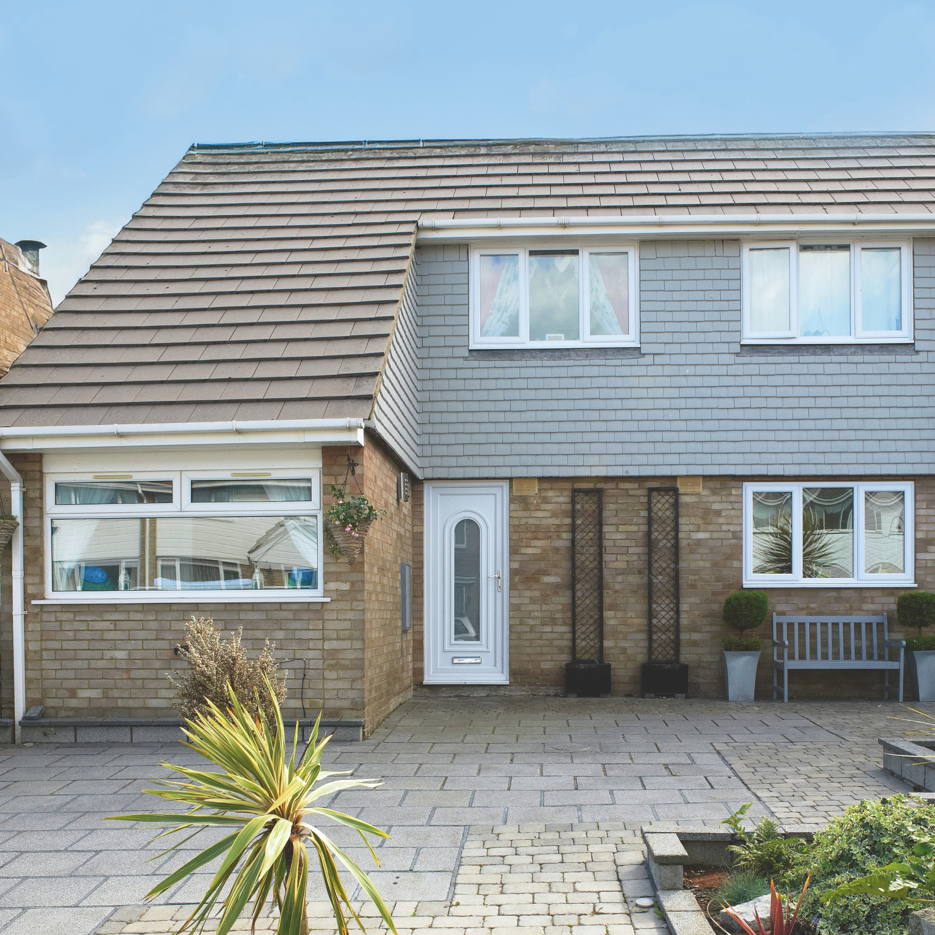 Four bedroom 1970's semi detached house with extension on the side.
