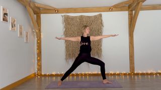 Warrior two demonstrated by yoga teacher Michelle Maslin-Taylor