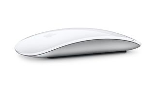 Apple's Magic Mouse 2 in white, seen from the side on a white background.