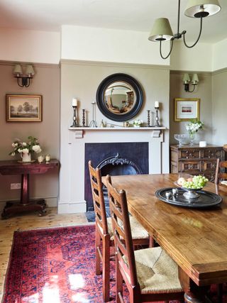 farmhouse dining room with fireplace and wooden table and chairs