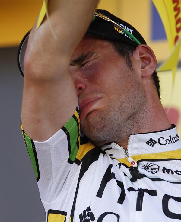 Mark Cavendish wipes away tears of joy, relief and elation.