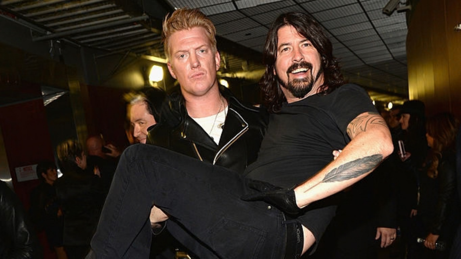 Josh Homme (L) of Queens of the Stone Age and Dave Grohl of Foo Fighters attends the 56th GRAMMY Awards at Staples Center on January 26, 2014 in Los Angeles, California. 