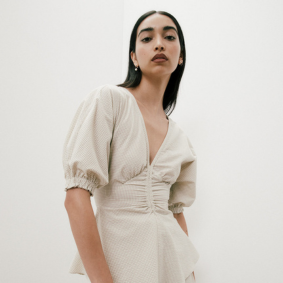 Woman wearing white Nordstrom dress