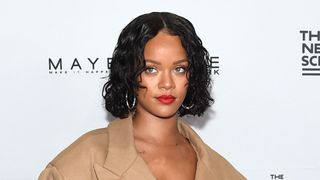 Honoree Rihanna is pictured with a wet-look curly bob whilst attending the 69th Annual Parsons Benefit at Pier 60 on May 22, 2017 in New York City.
