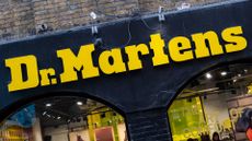 Dr Martens logo and branding pictured on a store front on on Neal Street in Covent Garden, London.