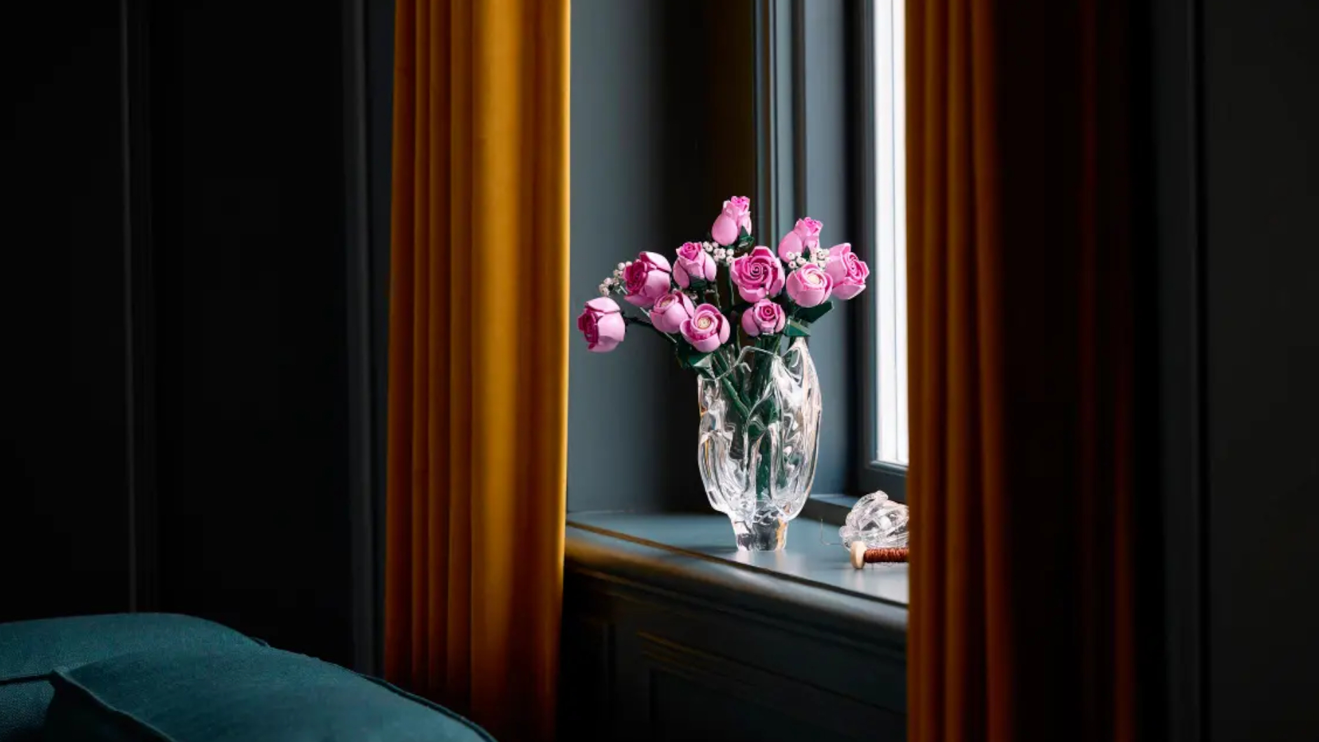 Lego Bouquet of Pink Roses in a glass vase on a windowsill
