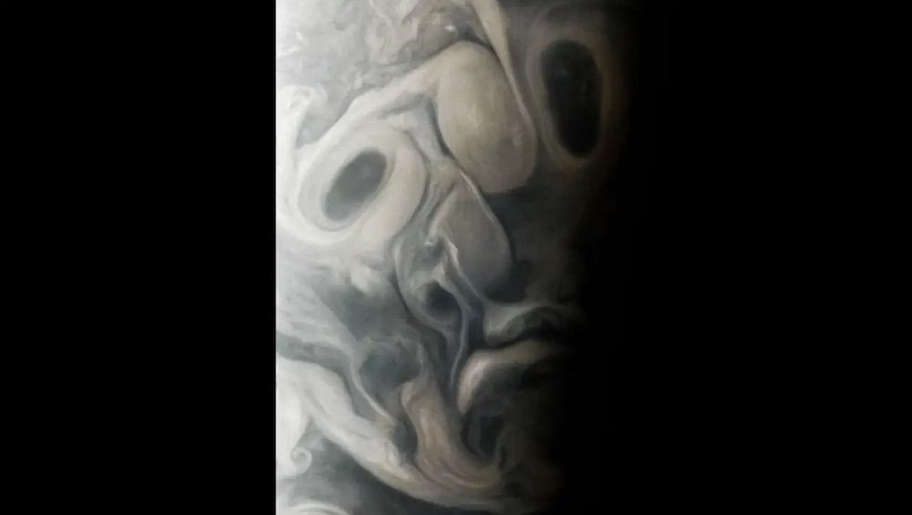 The swirling clouds of Jupiter forming a face