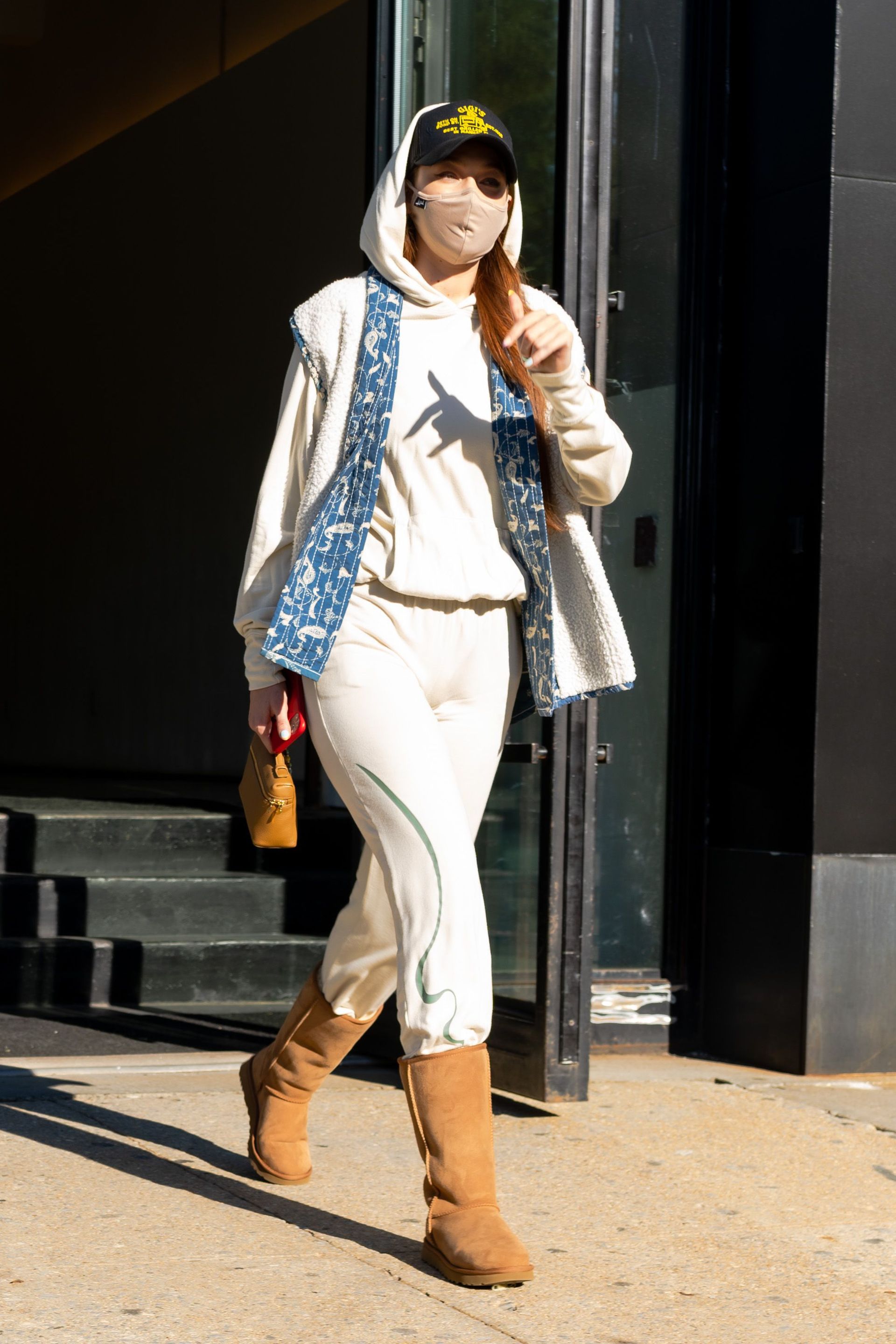 Photo of celebrity wearing tall UGG boots.