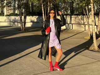 Fashion influencer and stylist Michelle Li wearing chic fall footwear with socks.