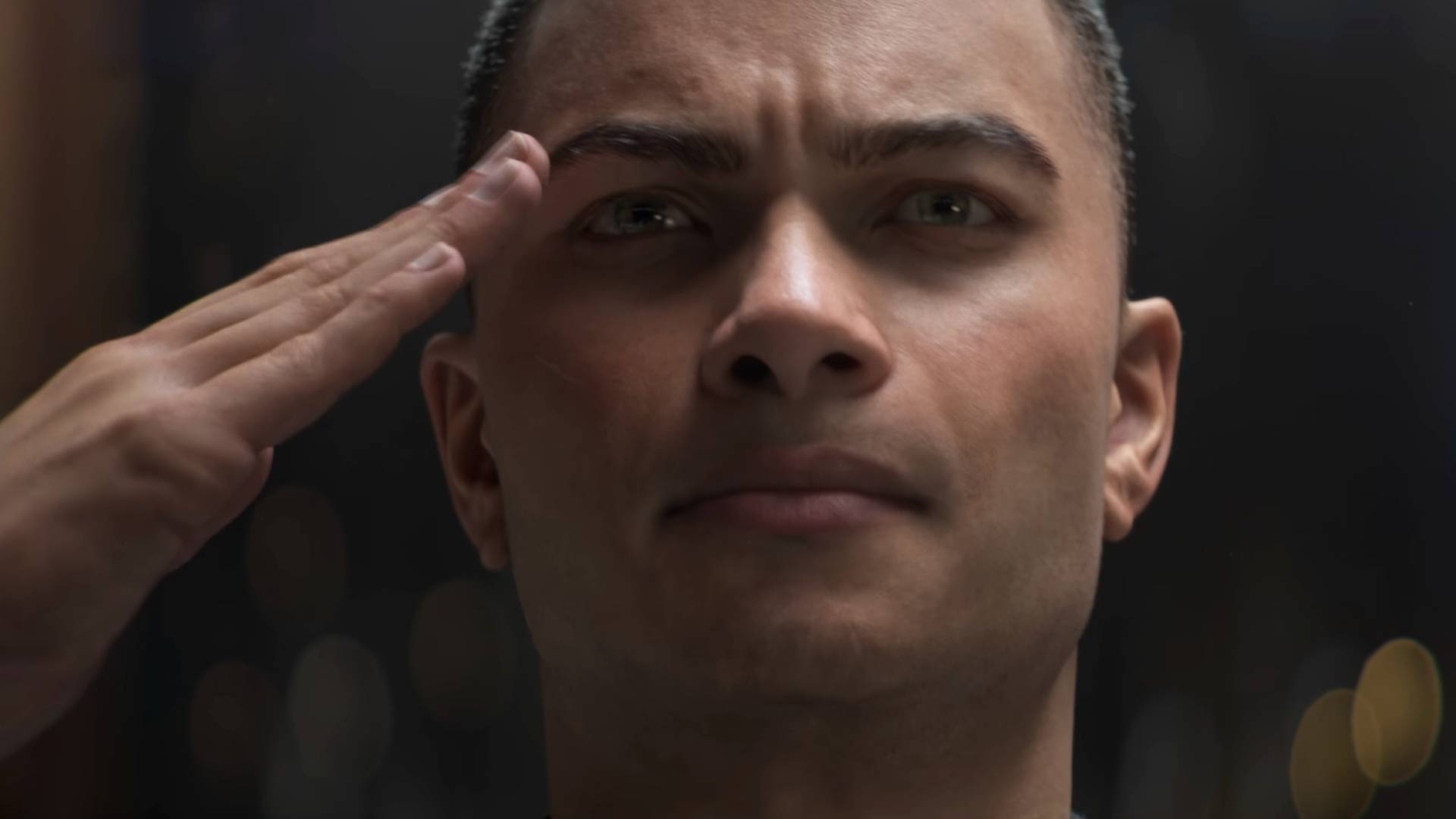 StarCraft cinematic screenshot shows a person saluting.