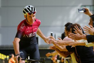 Team Ineos leader Chris Froome greets the crowd at the Saitama Criterium in Japan in October 2019