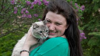 Happy woman with her cat