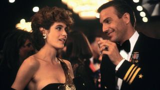 Sean Young as Susan Atwell and Kevin Costner as Lieutenant Commander Tom Farrell in No Way Out