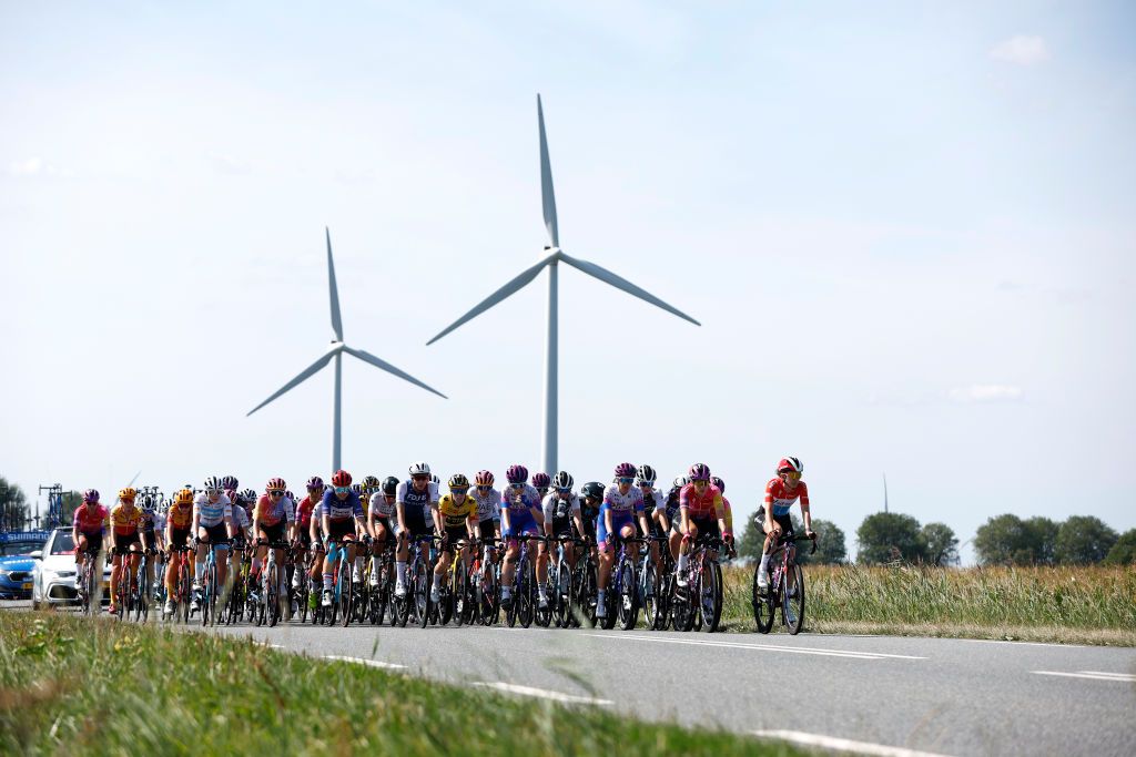 LELYSTAD NETHERLANDS AUGUST 30 A general view of the peloton passing through a landscape during the 25th Simac Ladies Tour 2022 Stage 1 a 1412km stage from Lelystad to Lelystad SLT2022 UCIWWT on August 30 2022 in Lelystad Netherlands Photo by Bas CzerwinskiGetty Images