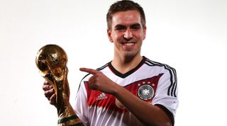 ZURICH, SWITZERLAND - JANUARY 12: Philipp Lahm of Germany poses with the FIFA World Cup Trophy prior to the FIFA Ballon d'Or Gala 2014 at the Park Hyatt hotel on January 12, 2015 in Zurich, Switzerland. (Photo by Alexander Hassenstein - FIFA/FIFA via Getty Images)