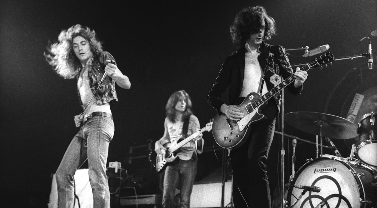 (left to right) Led Zeppelin&#039;s Robert Plant, John Paul Jones and Jimmy Page perform live at The Forum in Los Angeles on June 3, 1973 