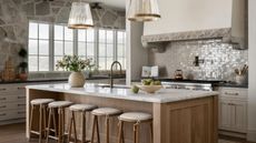 kitchen with marble countertops and stone walls
