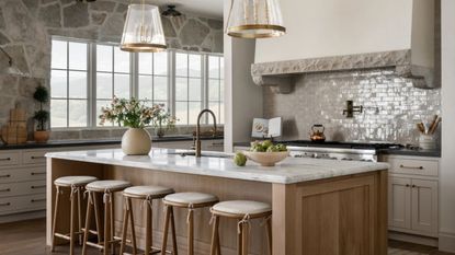 kitchen with marble countertops and stone walls