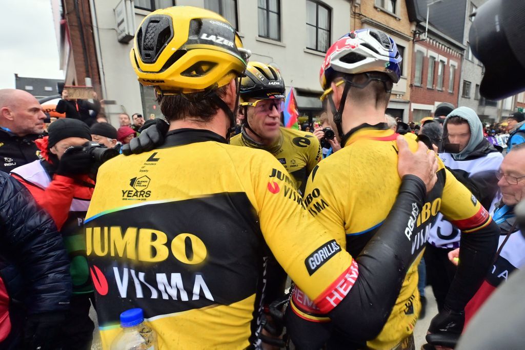 Belgian Wout van Aert of Team JumboVisma French Christophe Laporte of JumboVisma and Dutch Olav Kooij of JumboVisma celebrate after winning the mens GentWevelgem In Flanders Fields cycling race 2609 km from Ieper to Wevelgem Sunday 26 March 2023 BELGA PHOTO DIRK WAEM Photo by DIRK WAEM BELGA MAG Belga via AFP Photo by DIRK WAEMBELGA MAGAFP via Getty Images