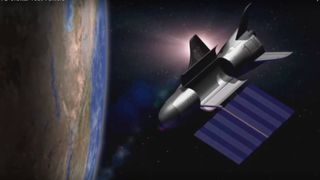 Artist's illustration of the U.S. Air Force's robotic X-37B space plane in Earth orbit.