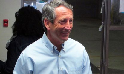 Congressional hopeful Mark Sanford leaves the voting booth on April 2 after casting his ballot at his precinct in Charleston, S.C.