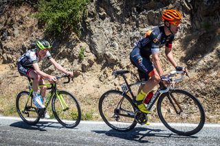 Michael Woods (Optum) and Tao Geoghegan Hart (Axeon) pull away from the field