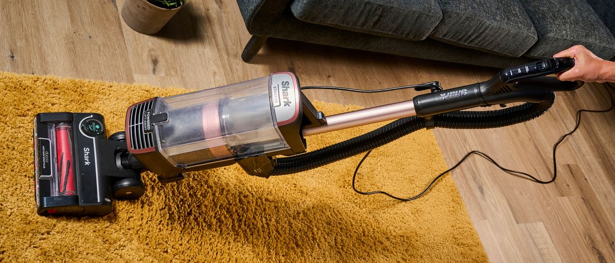 Shark Stratos Pet Pro Upright Vacuum cleaning a yellow rug