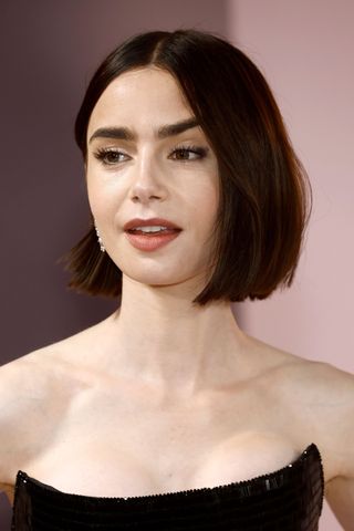 Lily Collins attends the Premiere of Netflix's "Emily In Paris" Season 4 Part 1 at The Egyptian Theatre Hollywood on August 14, 2024 in Los Angeles, California