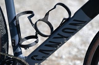 Detail of the downtube and bottle cages on the Canyon Grail CF SL AXS gravel bike