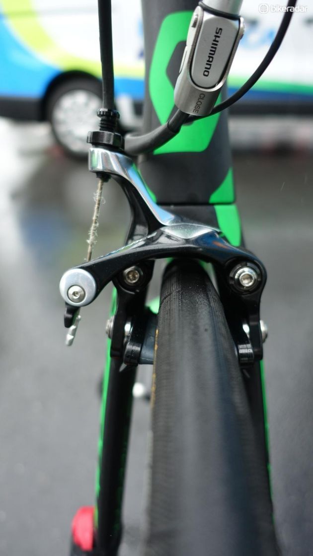 Direct-mount calipers front and rear. An inline adjuster acts as a quick release for the rear brake