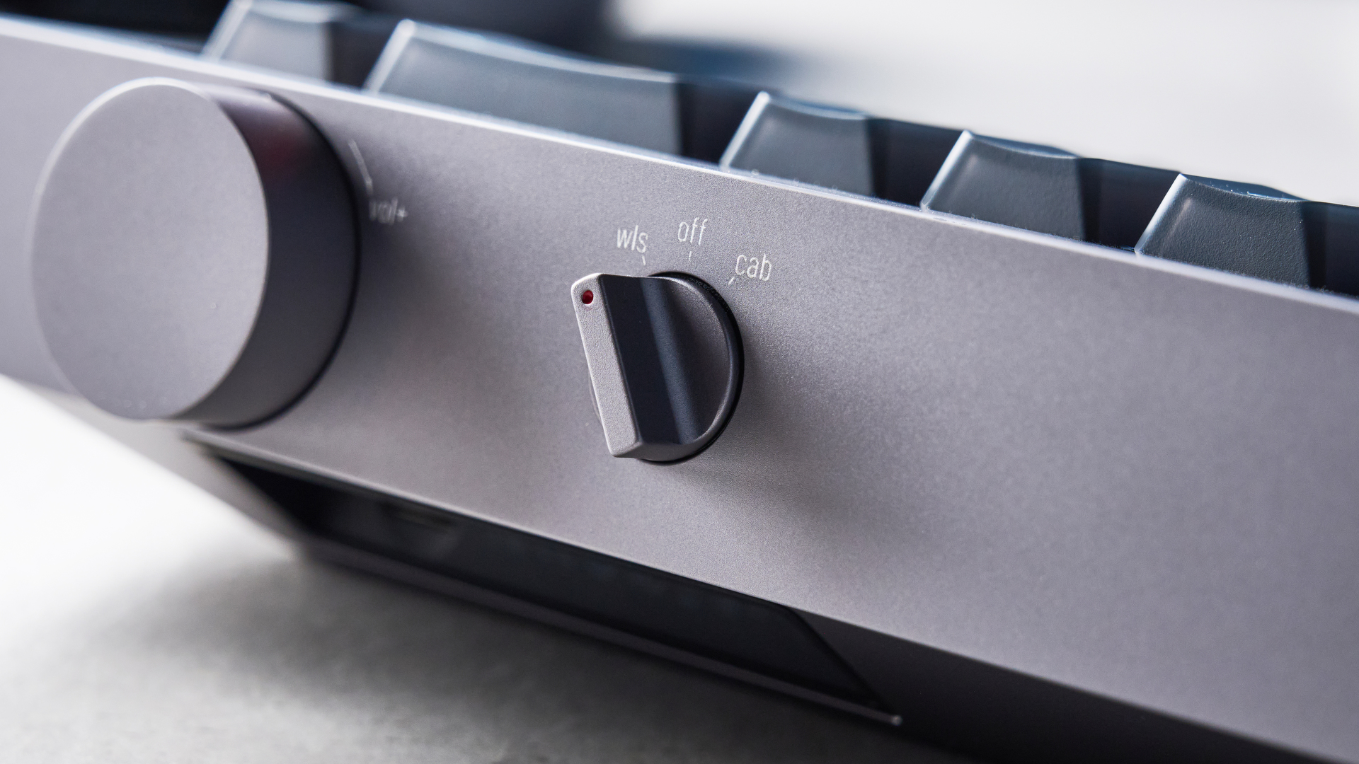 The Lofree Hyzen keyboard on a stone surface