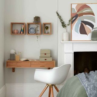 room with white wall and wooden table