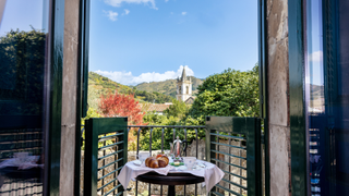 Terrace with breakfast at Palazzo Previtera.