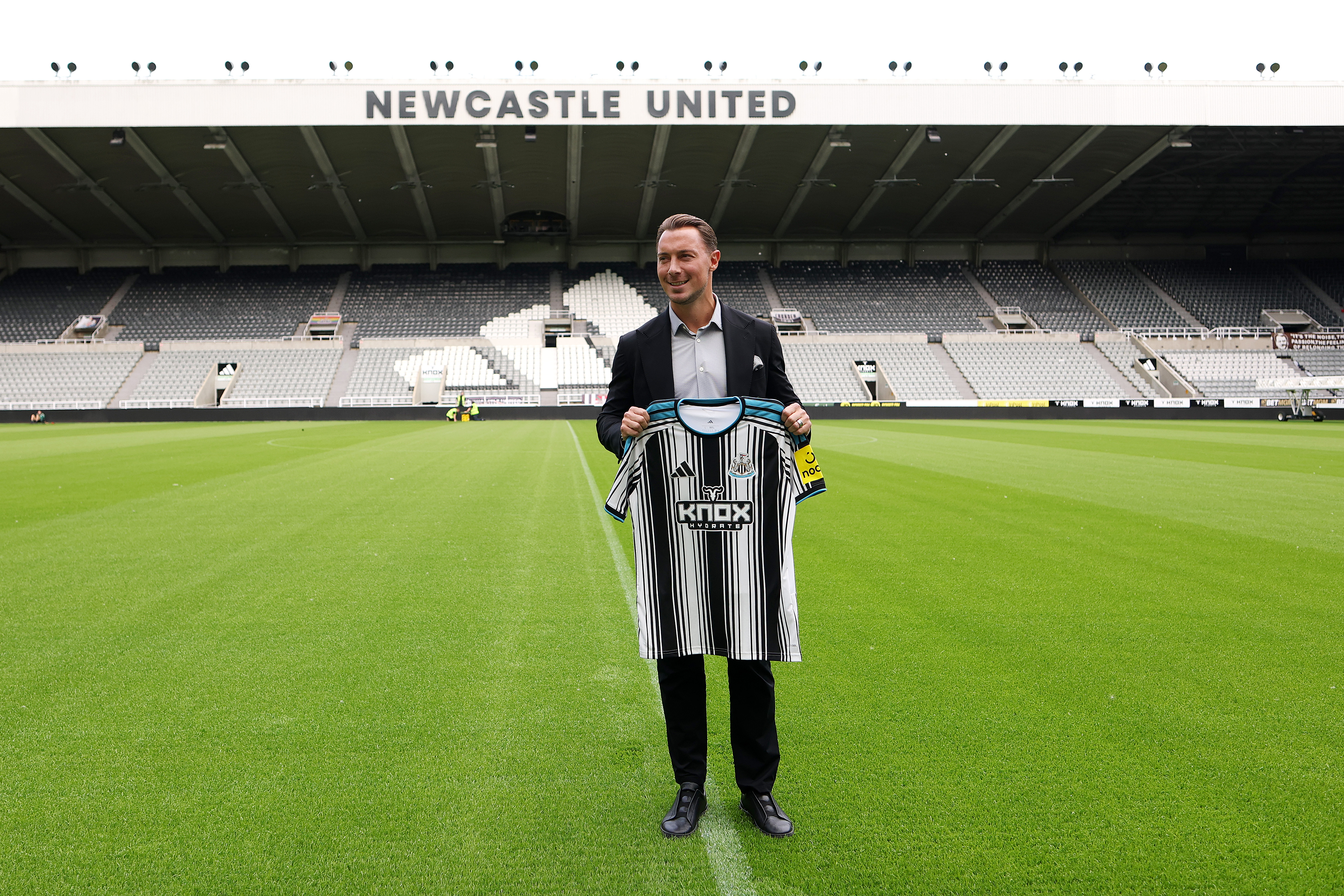 NEWCASTLE UPON TYNE, ENGLAND - AUGUST 11: Matthias Jaissle, Manager of Newcastle United, poses for a photo on the pitch whilst holding a Newcastle United home shirt as he is unveiled as the new Newcastle United manager at St James&amp;apos; Park on August 11, 2026 in Newcastle upon Tyne, England. (Photo by Stu Forster/Getty Images)
