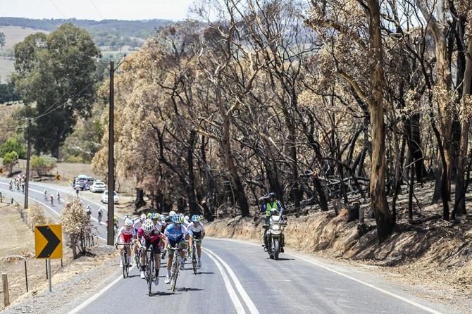 As the race headed up the climb, the fire damage was evident