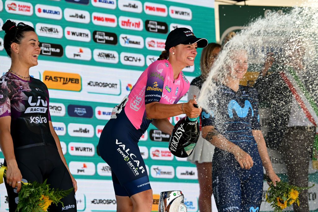 PADOVA ITALY JULY 10 LR Rachele Barbieri of Italy and Team Liv Racing Xstra on second place stage winner Chiara Consonni of Italy and Valcar Travel Service Team and Emma Norsgaard Jorgensen of Denmark and Movistar Team on third place pose on the podium during the podium ceremony after the 33rd Giro dItalia Donne 2022 Stage 10 a 905km stage from Abano Terme to Padova GiroDonne UCIWWT on July 10 2022 in Padova Italy Photo by Dario BelingheriGetty Images