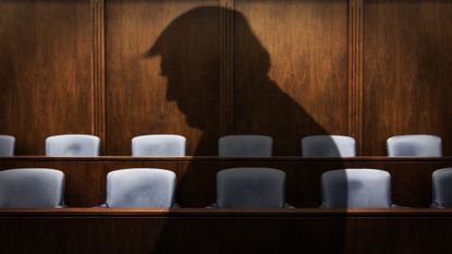 Silhouette of Donald Trump against a jury box