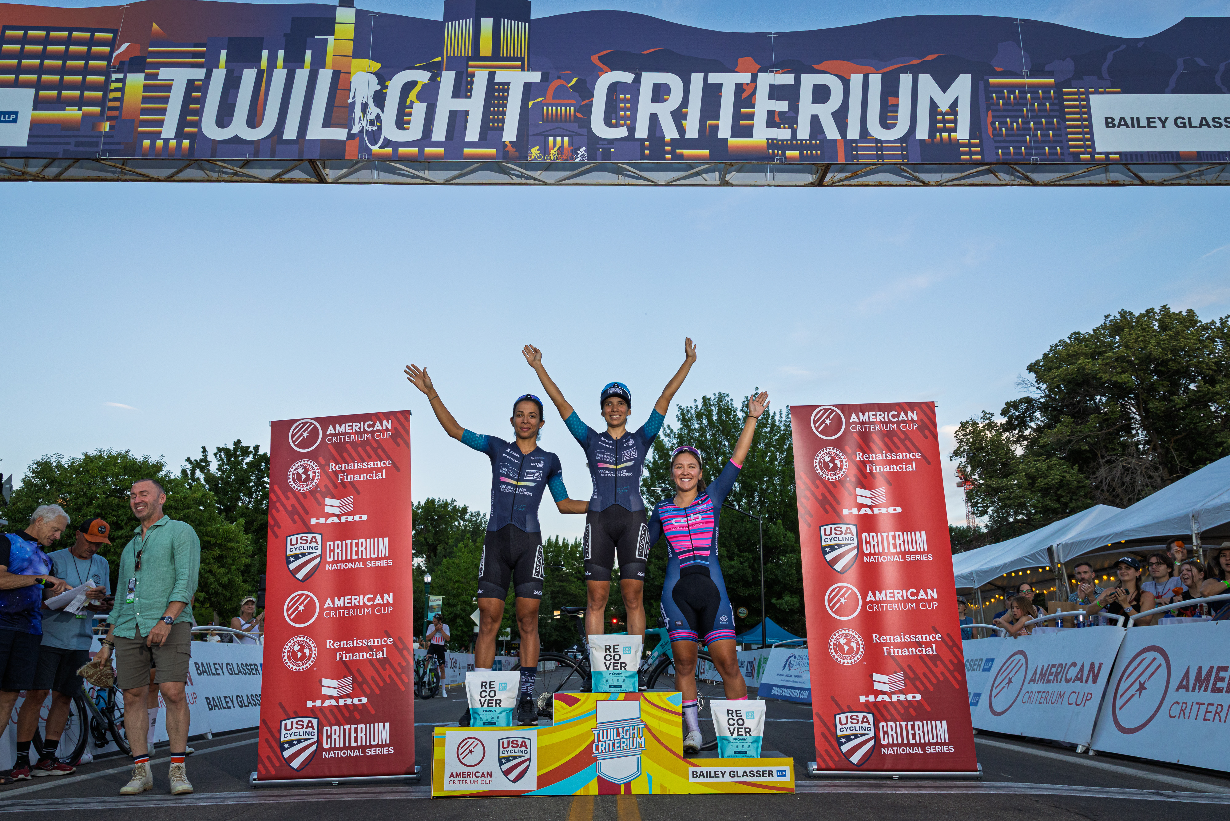 Women's podium at 2025 Boise Twilight Criterium (L to R): Virginia's Blue Ridge TWENTY28 riders Marlies Mejías in second and winner Sofia Arreola stand next to third-placed Makayla MacPherson (CCB p/b Levine Law Group)