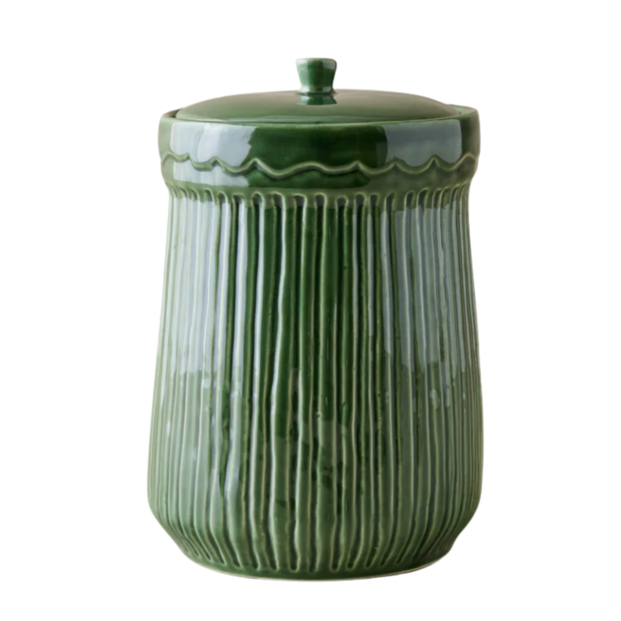 a green ceramic jar with a lid