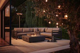 outdoor sofa ideas: sofa with gas fire pit