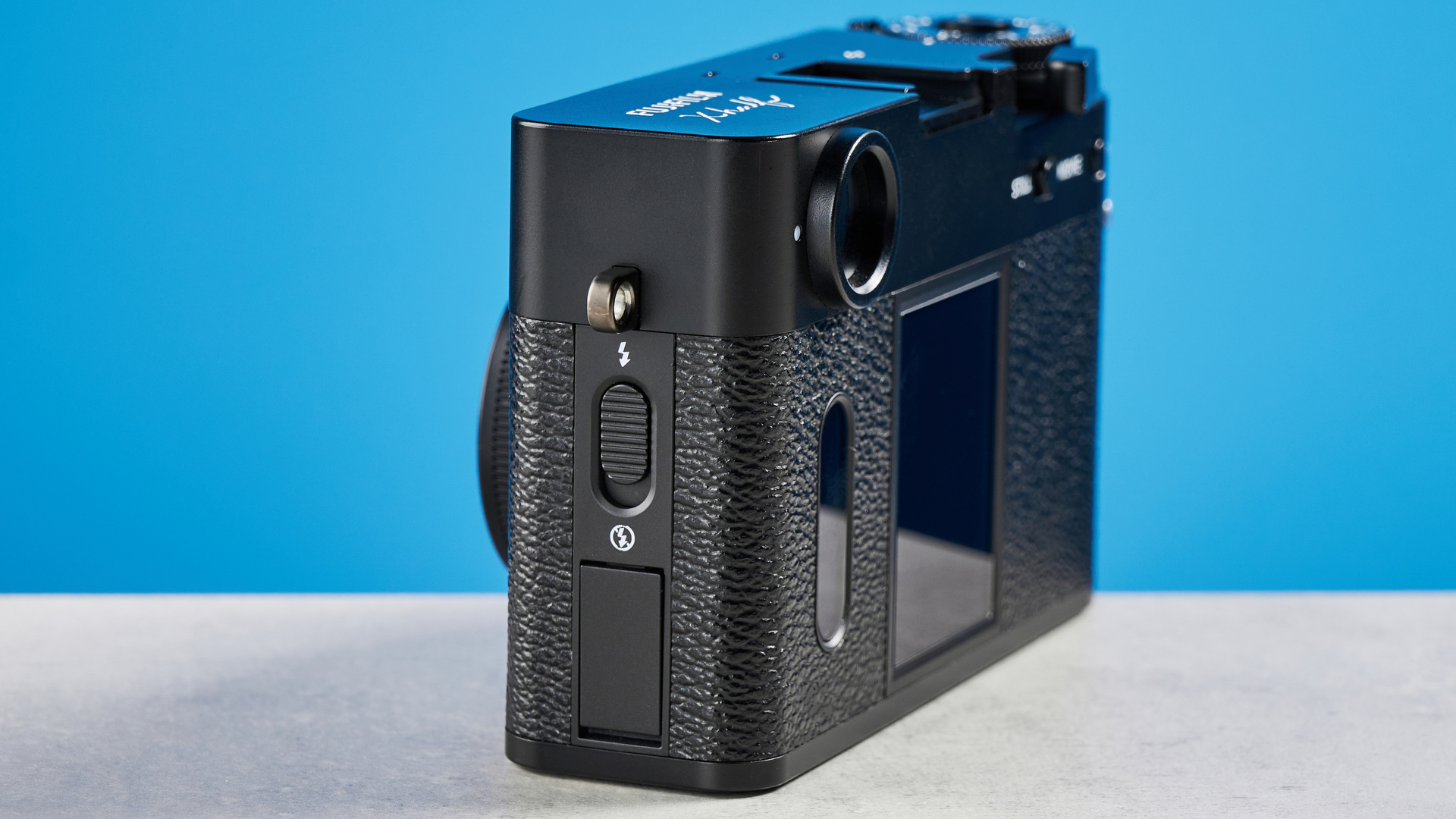 A black Fujifilm X half camera