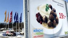 A billboard for IKEA meatballs in a car park outside a store in Stockholm