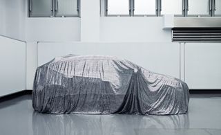Luxgen electric car, covered in a silver material, Sanyi