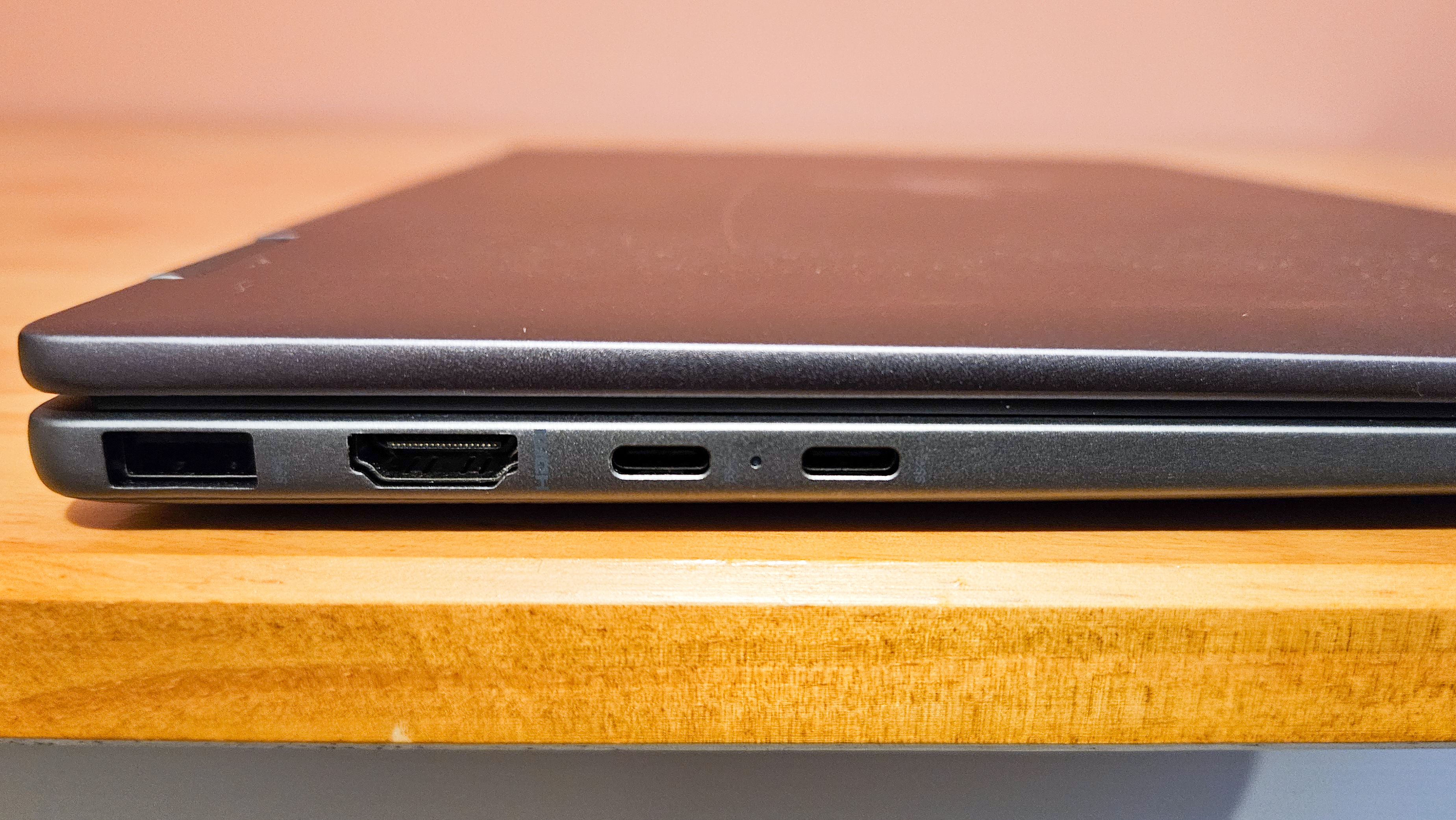 HP Envy x360 14 laptop on table (ports).