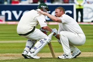 Andrew Flintoff (right) of England consoles Brett Lee (left) of Australia after England won the 2nd Ashes Test Match by two runs at the Edgbaston cricket ground on August 7th 2005 (Photo by Tom Jenkins/Getty Images)