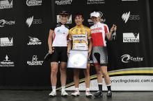 Giorgia Bronzini flanked by Annette Edmondson and Tiffany Cromwell on the women's podium.